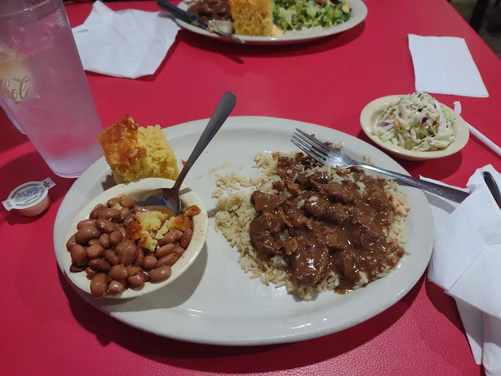 Beef Tips Smothered in Gravy over Rice with Pinto Beans and Coleslaw